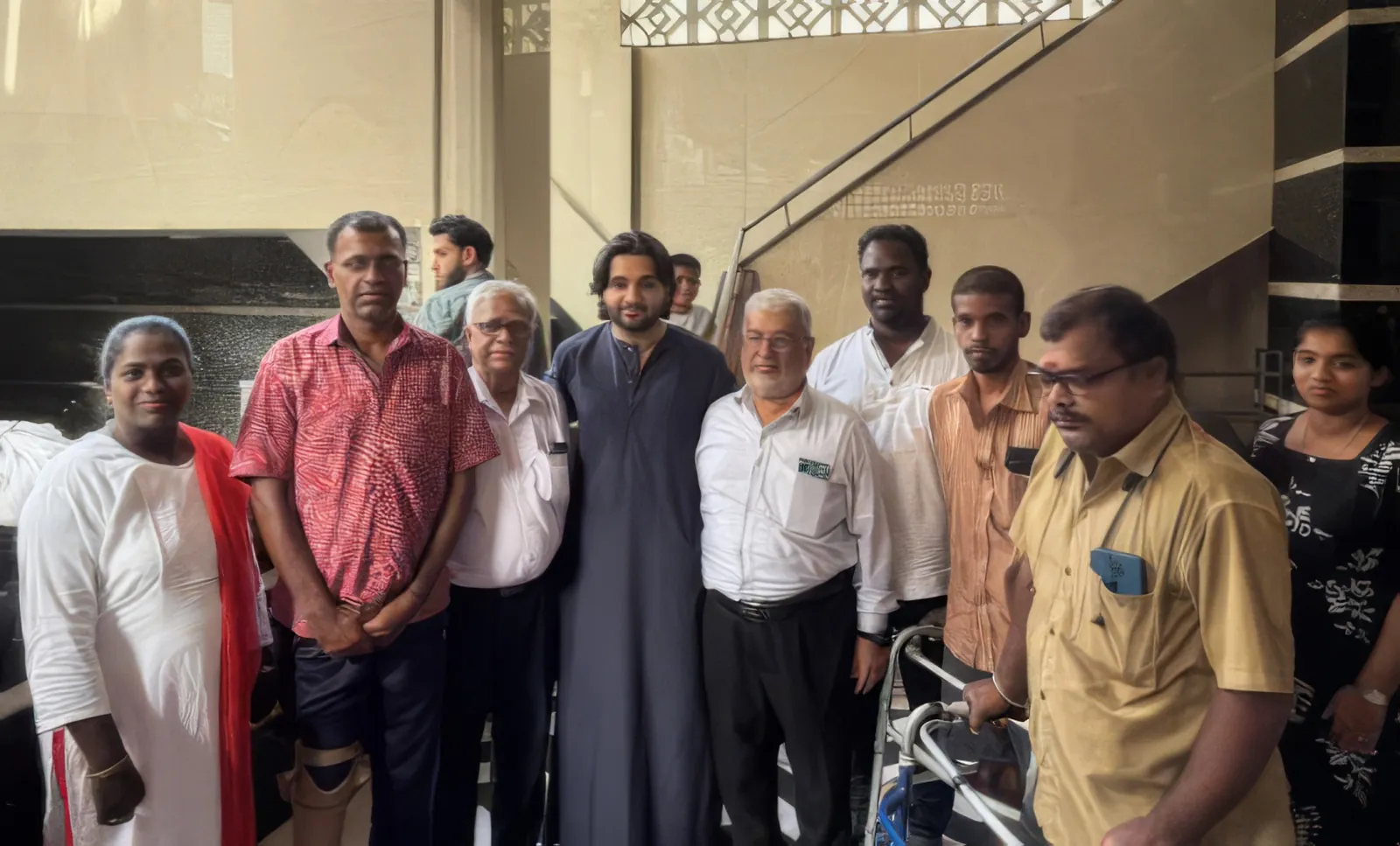 Salmaan Ahmed with community members