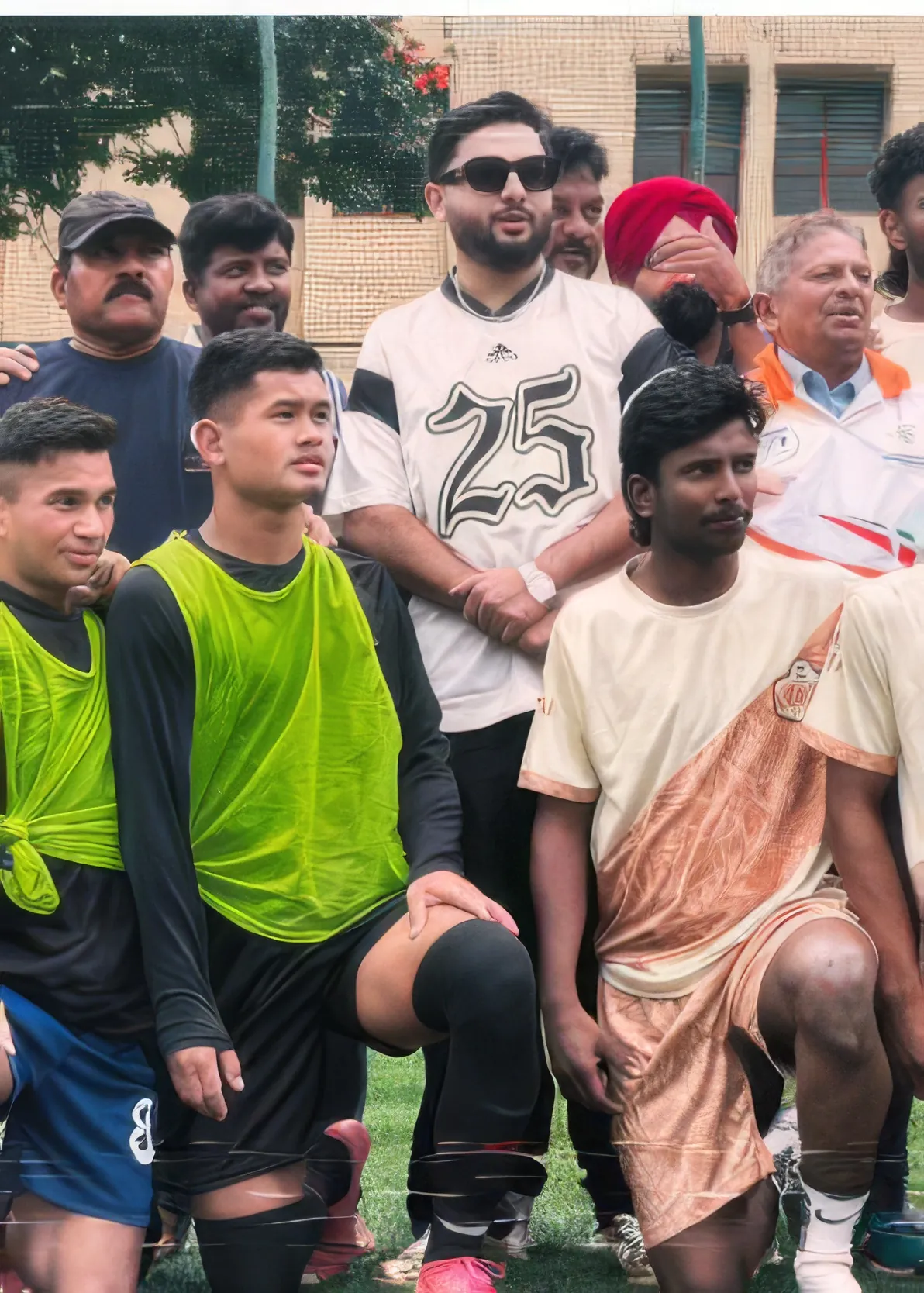 Salmaan Ahmed with young footballers