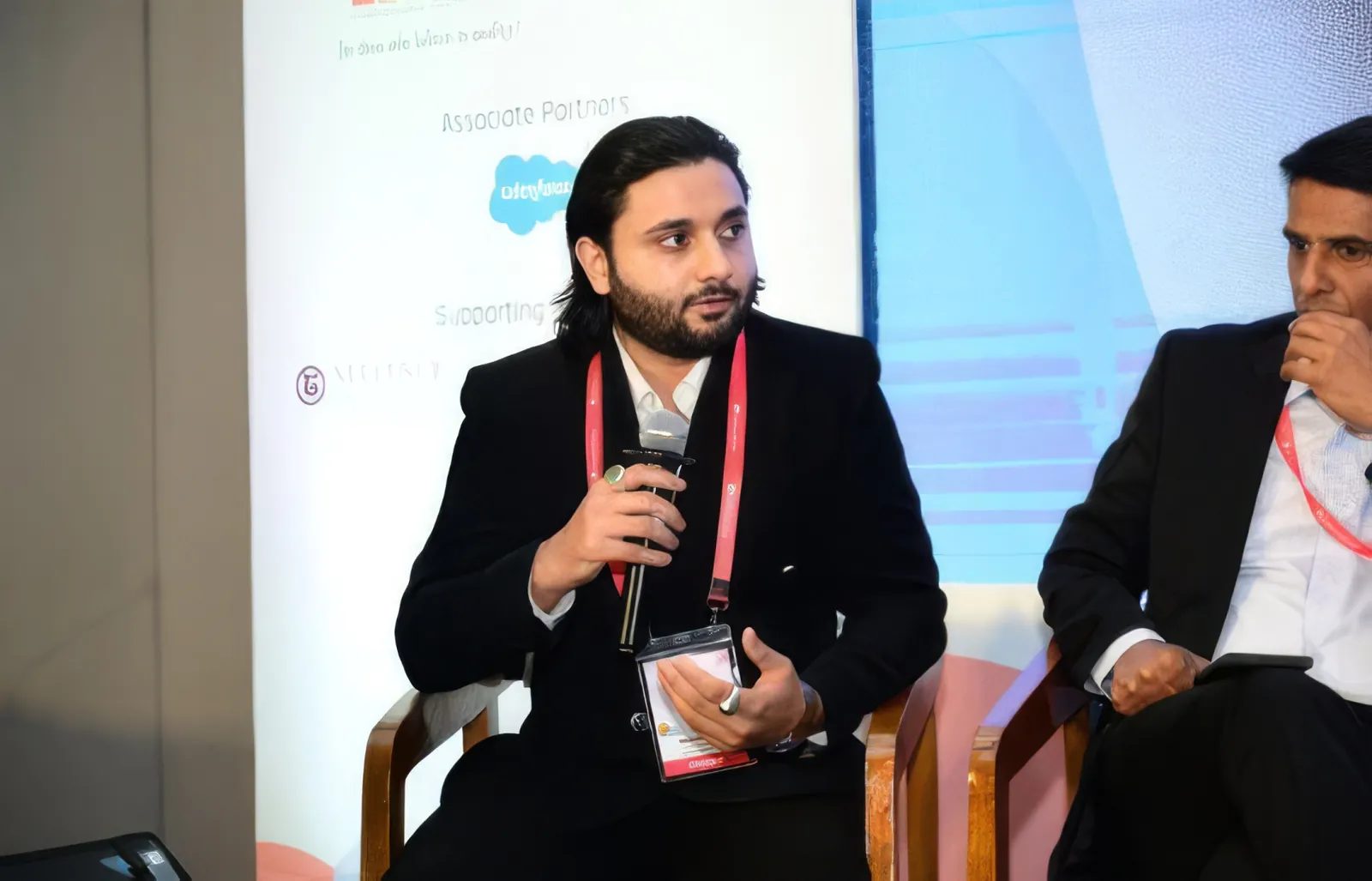 Salmaan Ahmed speaking on a panel